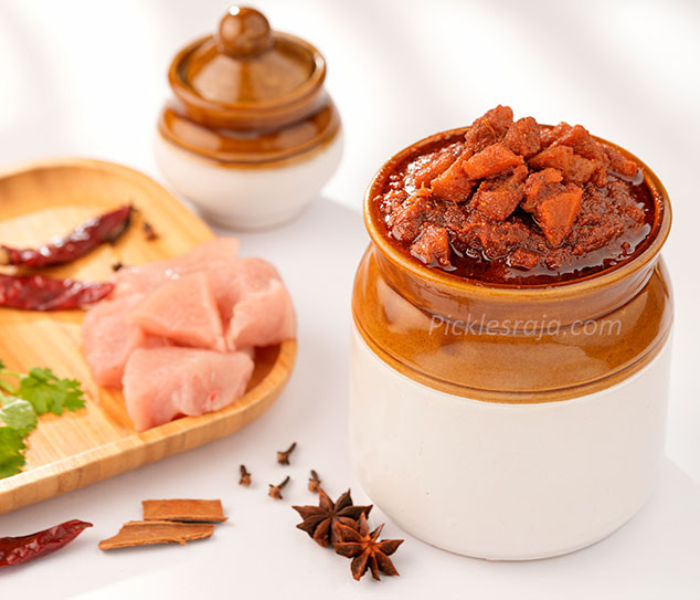 Authentic South Indian Chicken Pickle – PicklesRaja Spicy and flavorful South Indian Boneless Chicken Pickle – Taste the Tradition with PicklesRaja